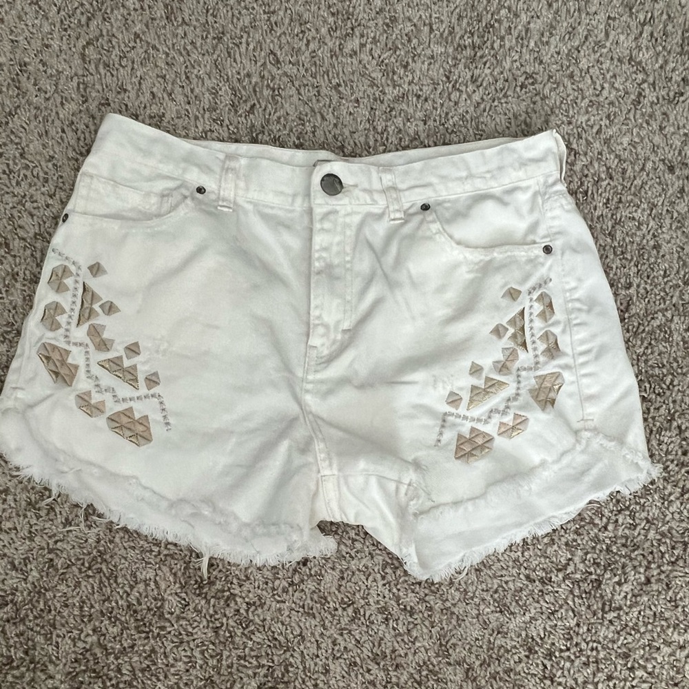 Free People white denim high rise shorts